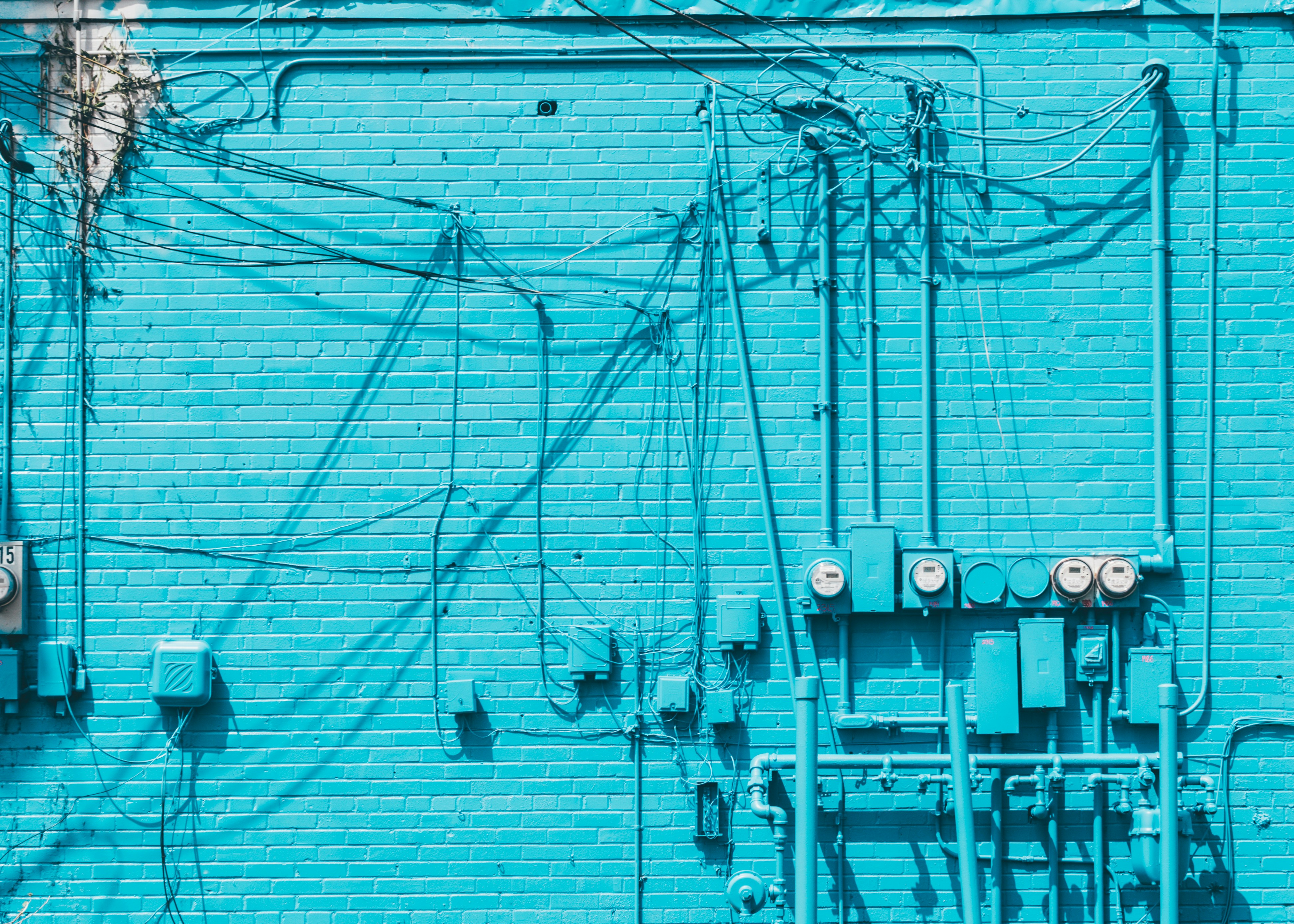 Pipes and cables on a wall